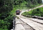 IMG 0529A  En tung læsset tømmerlastbil på vej over en bro i Danum Valley Borneo